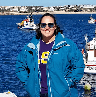 Andy Fontenot in front of water and boats