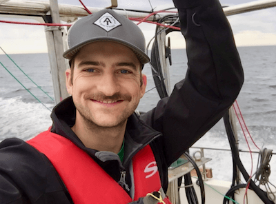 Headshot of Josh Harringmeyer on a boat