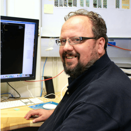 Liviu Giosan sitting at a computer desk