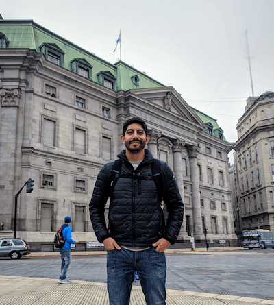 Talib Oliver Cabrera in front of the Bank of Argentina building