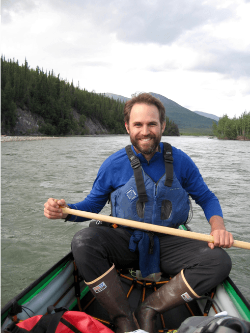 Tamlin Pavelsky canoeing on a lake